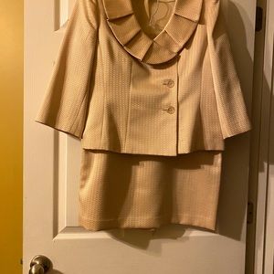 Ladies two piece skirt suit, gold color.